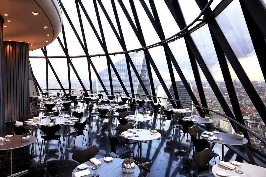 The Helix Bar - The Gherkin - Tables and a view from the window over London